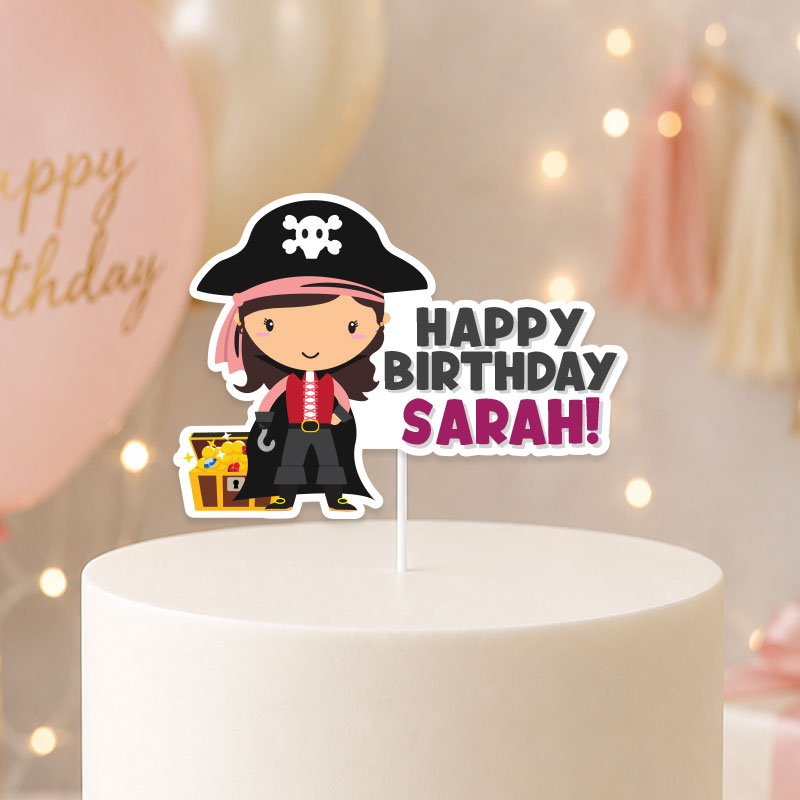 Digital-mockup-of-a-personalised-cute-pirate-girl-cake-topper-placed-on-cake