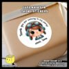 Personalize-Aviator-Theme-Stickers-For-Party-Decorations-Design-E-Pasted-on-Gift-Box Digital mockup of a cute aviator pilort round sticker pasted on gift box