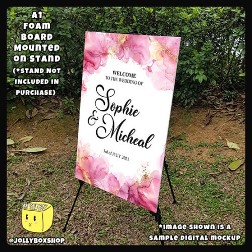 Digital mockup of a A1 Size Pink and Gold Splashes theme welcome to wedding board Placed on Stand
