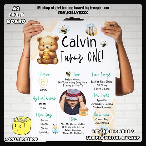 Digital mockup of a person holding a A2 size Baby Bear and Bees theme milestone board