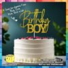 Digital mockup of a fixed design with text Birthday Boy cake topper placed on a cake