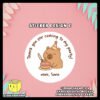 Digital-Mockup-of-Cute-Capybara-cutting-a-cake-Theme-Sticker-Design-C Digital mockup of a cute capybara round sticker design C